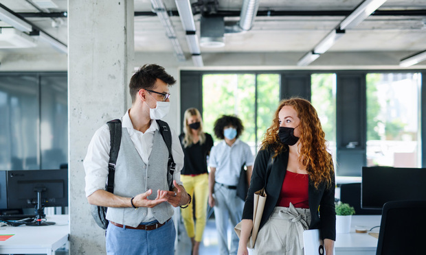 One strategy to stem the tide of workers choosing to exit is to make it easier and more productive for them to use their voices instead. In other words, you have to listen and communicate to your employees differently. (Credit: Halfpoint/Shutterstock.com)