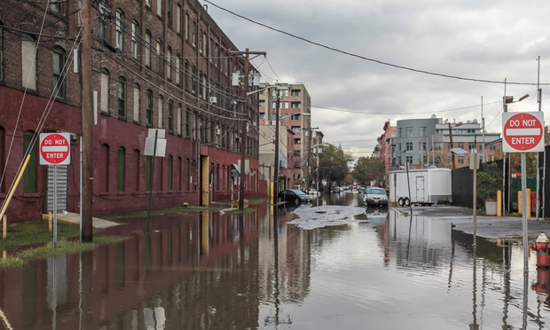 Flooding is the most costly type of natural disaster in America, and climate change is accelerating its impact. (Sergey/Adobe Stock)