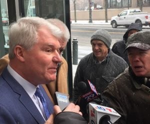 John Dougherty addresses reporters outside the courthouse following his arraignment, Feb. 1, 2019. (Photo: P.J. D'Annunzio/ALM)