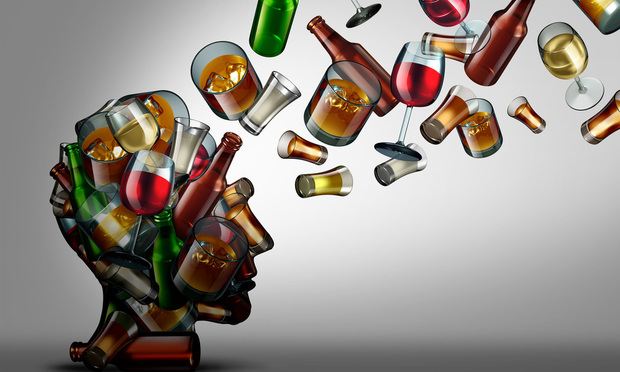 Alcohol bottles forming the shape of a human head