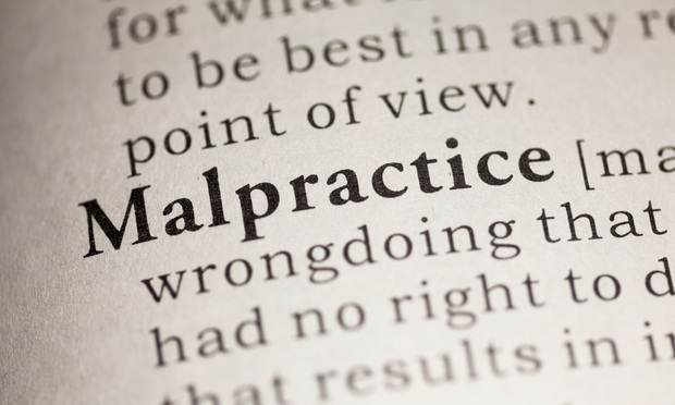 Fake Dictionary, Dictionary definition of the word Malpractice. Credit: Feng Yu/Shutterstock.com