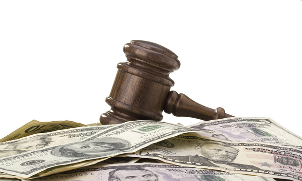 Gavel and a pile of money
