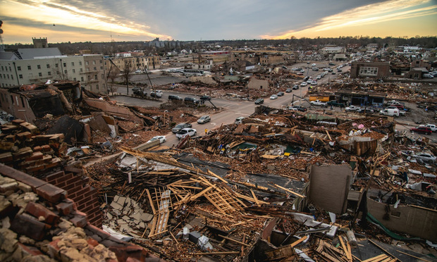 Damaged buildings following a tornado in Mayfield, Kentucky, U.S., on Saturday, Dec. 11, 2021. Tornadoes ripped across several U.S. states late Friday, killing more than 70 people in Kentucky, at least two at a nursing home in Arkansas and an undetermined number at an Amazon.com warehouse that was partially flattened in Illinois. Photo: Liam Kennedy/Bloomberg