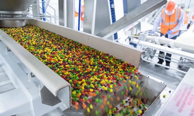 Skittles coming off a production line. (Credit: Mars, Inc.)