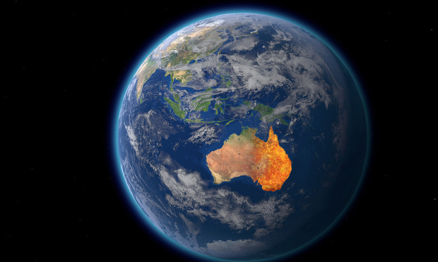 The earth, as seen from space, with the continent of Australia on fire.