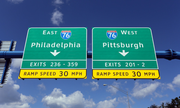 An interstate sign in Pennsylvania gives drivers the choice of driving to Philadelphia or Pittsburgh.