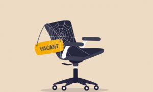 An illustration of a rolling chair with a cobweb in it, and a 