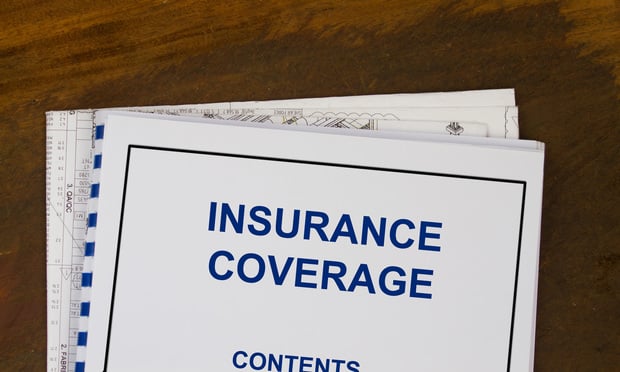 A document that says "Insurance Coverage contents" is on a desk.