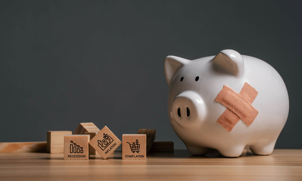Roughly one in three U.S. adults withdrew some of their retirement savings last year to keep up with rising expenses. (Photo: narawit/Adobe Stock)