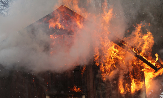 A house engulfed in flames