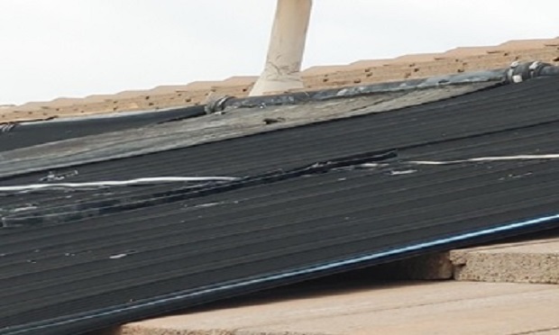 Water began to leak from underneath multiple solar water heating panels because of an internal plumbing and connections failure caused by wind. 