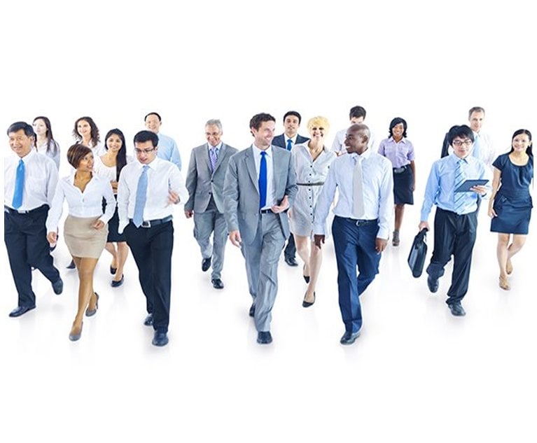 A group of business people walking in front of a white background