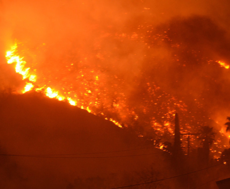 The California Department of Insurance currently allows the use of catastrophe models for earthquake losses and fire following earthquake. The proposed regulation expands the allowable use of catastrophe models to include wildfire, terrorism and flooding in order to better determine rates for homeowners and commercial insurance. In this image, a wildfire engulfs a hill in Ventura County. (Credit: Rocco Constantino via Shutterstock/ALM archives)