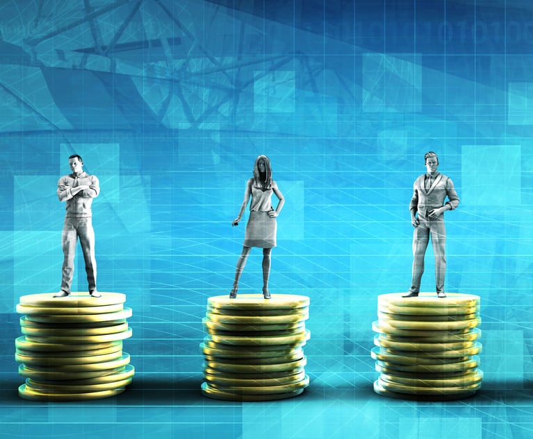 An illustration of people standing on stacks of coins.