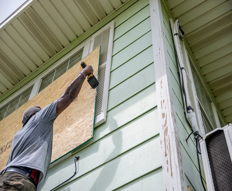 A resident boards up an apartment ahead of Hurricane Beryl's arrival in Corpus Christi, Texas on July 7. (Photographer: Brandon Bell/Getty Images via Bloomberg)