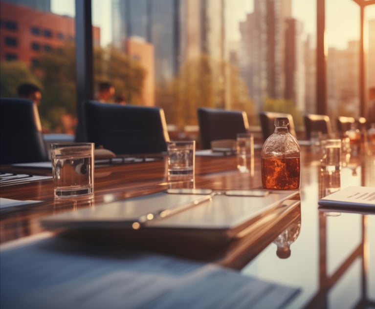 Blurred photo of business people at a business meeting table