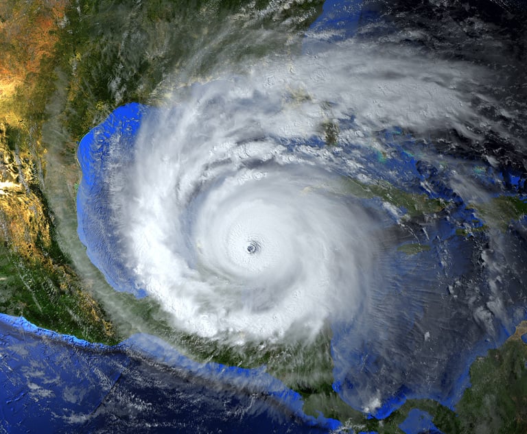 Hurricane approaching the American continent visible above the Earth. Elements of this image furnished by NASA. 