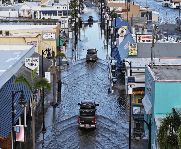 Flood waters inundate the main street after Hurricane Helene passed offshore on September 27, 2024 in Tarpon Springs, Florida. Hurricane Helene made landfall Thursday night in Florida's Big Bend with winds up to 140 mph and storm surges. (Photo credit: Joe Raedle/Getty Images North America/Bloomberg)