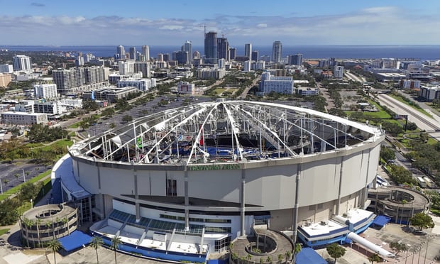 Severe convective storms can unleash damaging wind and hail that are a major threat to properties, particularly roofs. Here, the roof of the Tropicana Field is damaged the morning after Hurricane Milton hit the region, Thurs., Oct. 10, 2024, in St. Petersburg, Fla. (Credit: Mike Carlson/AP)