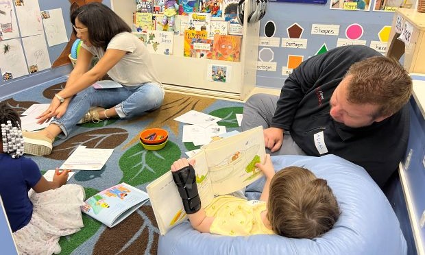 Volunteers work with children at The Center.