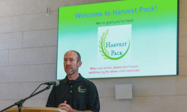 William McNally speaks at a Harvest Pack event. (Courtesy photo)