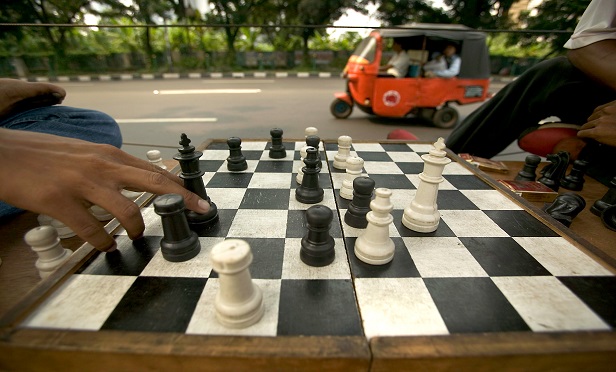 Men playing chess