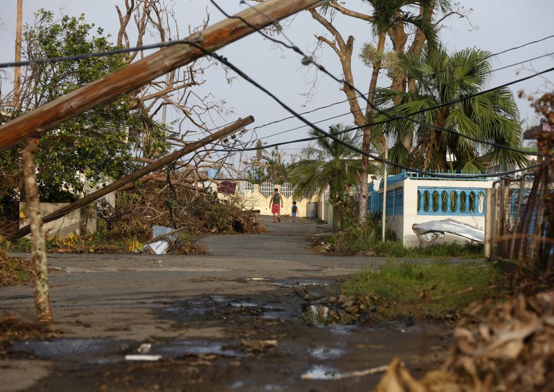 Trump defends response to `historic' damage in Puerto Rico [photos ...